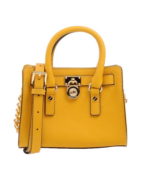 yellow michael kors crossbody bag|michael kors denim crossbody bag.